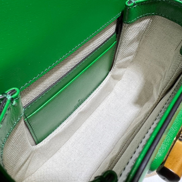 G*u*i mini top handle bag with bamboo